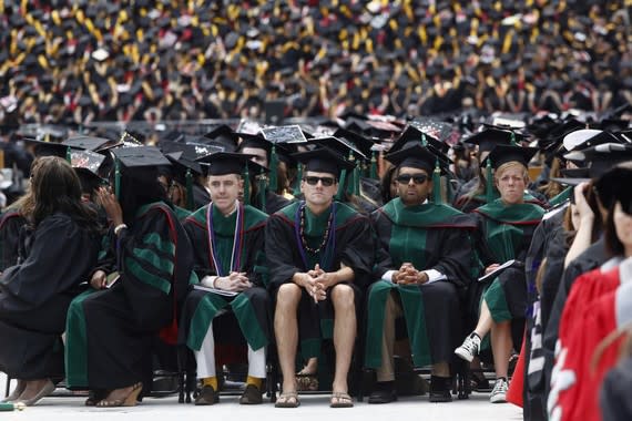 Students_Graduation_Looking_Bored.jpg