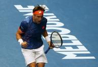 Spain's David Ferrer celebrates winning the second set during his quarter-final match against Britain's Andy Murray at the Australian Open tennis tournament at Melbourne Park, Australia, January 27, 2016. REUTERS/Jason O'Brien Action Images via Reuters