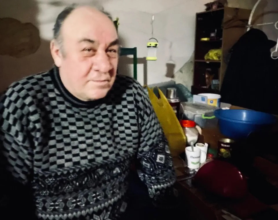 Oleksander Sinkov speaks with CBS News in the basement of a school in the southeast Ukrainian village of   Velyka Novosilka, where he took shelter with dozens of other mostly-elderly residents after his home was destroyed early in Russia's invasion. / Credit: CBS News/Agnes Reau