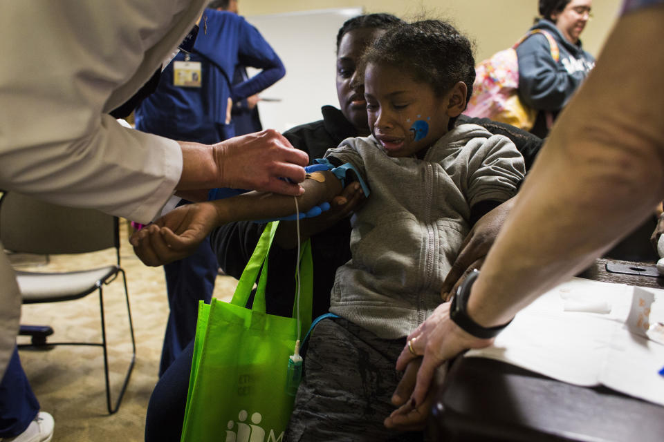 A 6-year-old boy in Flint, Michigan, has&nbsp;blood drawn to test his blood lead levels on Feb. 4, 2016. (Photo: Brittany Greeson for The Washington Post via Getty Images)
