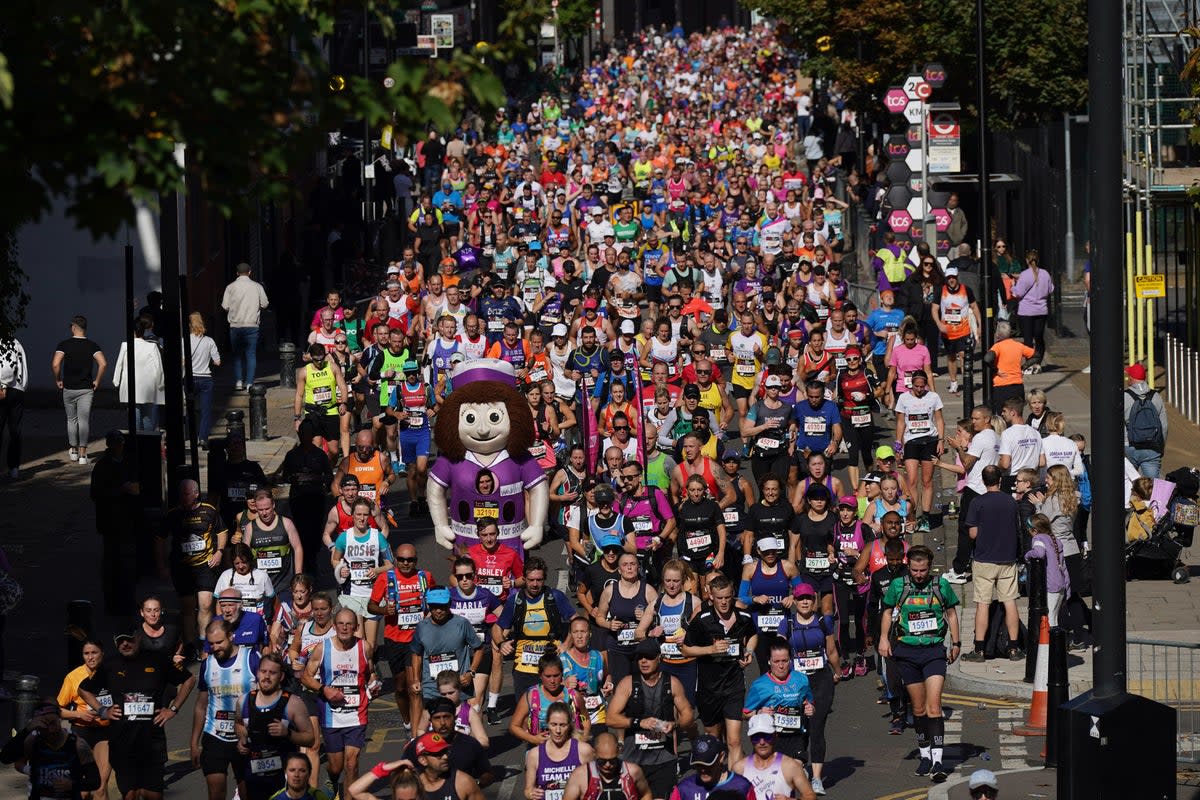 Runners reach the Isle of Dogs during the TCS London Marathon 2022 (Yui Mok/PA) (PA Archive)