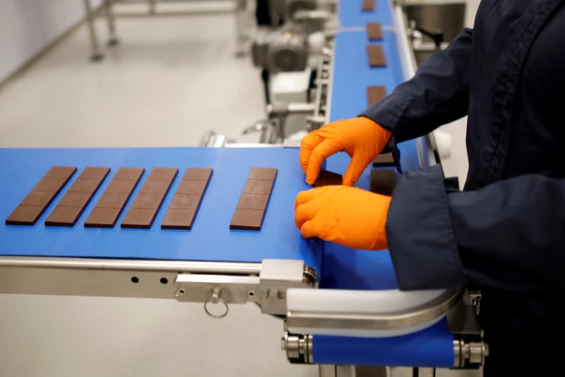 FILE PHOTO: Chocolate bars are sorted during a tour at a Canopy Growth facility