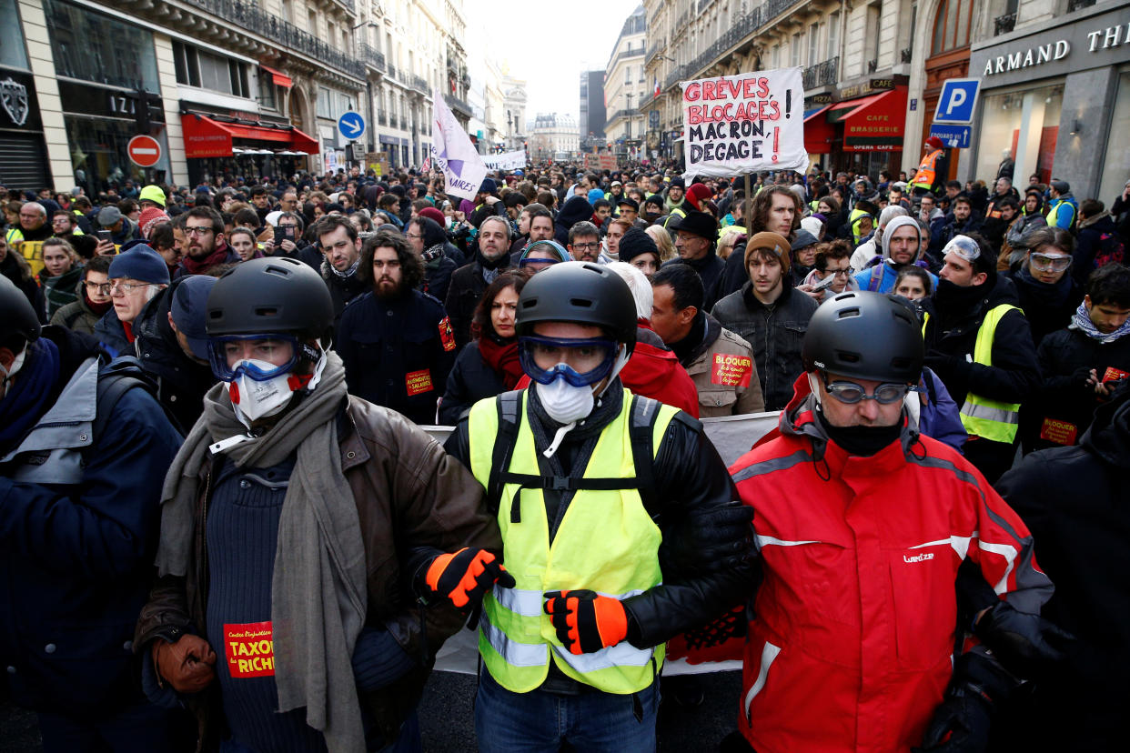 Protesters wearing yellow vests at a demonstration against French President <span>Emmanuel </span>Macron in Paris on Saturday. (Photo: Stephane Mahe/Reuters)