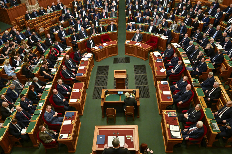 Hungarian Prime Minister Viktor Orban addresses a parliament session, on the day lawmakers are expected to approve Sweden's accession into NATO, in Budapest, Hungary, Monday, Feb 26, 2024. Hungary's parliament is to vote Monday on ratifying Sweden's bid to join NATO, likely bringing an end to more than 18 months of delays that have frustrated the alliance as it seeks to expand in response to Russia's war in Ukraine. (AP Photo/Denes Erdos)