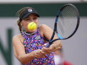 United States's Sofia Kenin plays a return to United States's Jessica Pegula during their third round match on day 7, of the French Open tennis tournament at Roland Garros in Paris, France, Saturday, June 5, 2021. (AP Photo/Michel Euler)