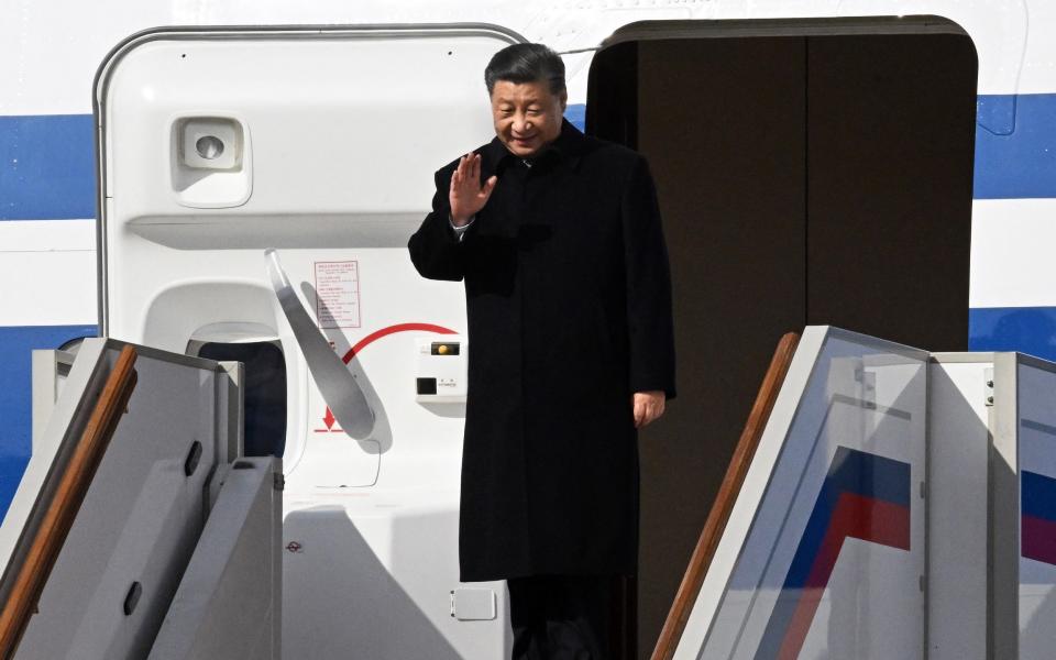 China president Xi Jinping arrives at Moscow's Vnukovo airport - ANATOLIY ZHDANOV/AFP