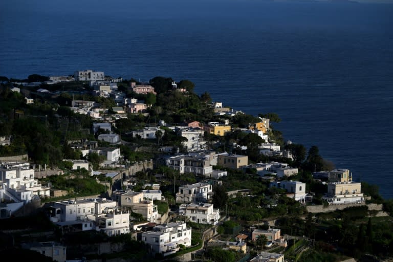 Capri, an island in Italy's Bay of Naples, draws vast numbers of day-trippers in summer months (Tiziana FABI)