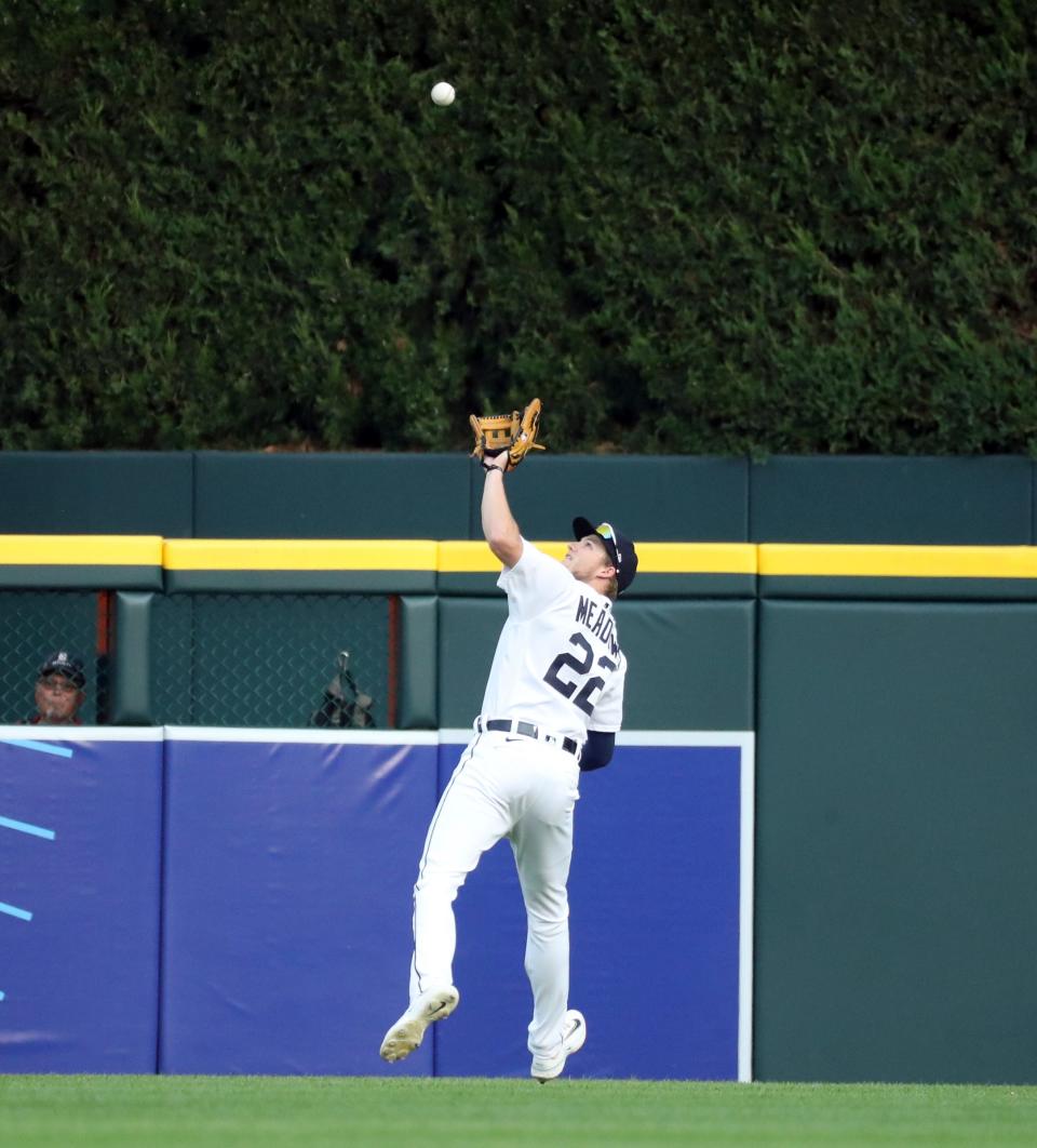 Detroit Tigers center fielder Parker Meadows (22) catches a fly ball hit by Chicago Cubs center fielder Cody Bellinger (24) during second-inning action at Comerica Park in Detroit on Monday, Aug. 21, 2023.