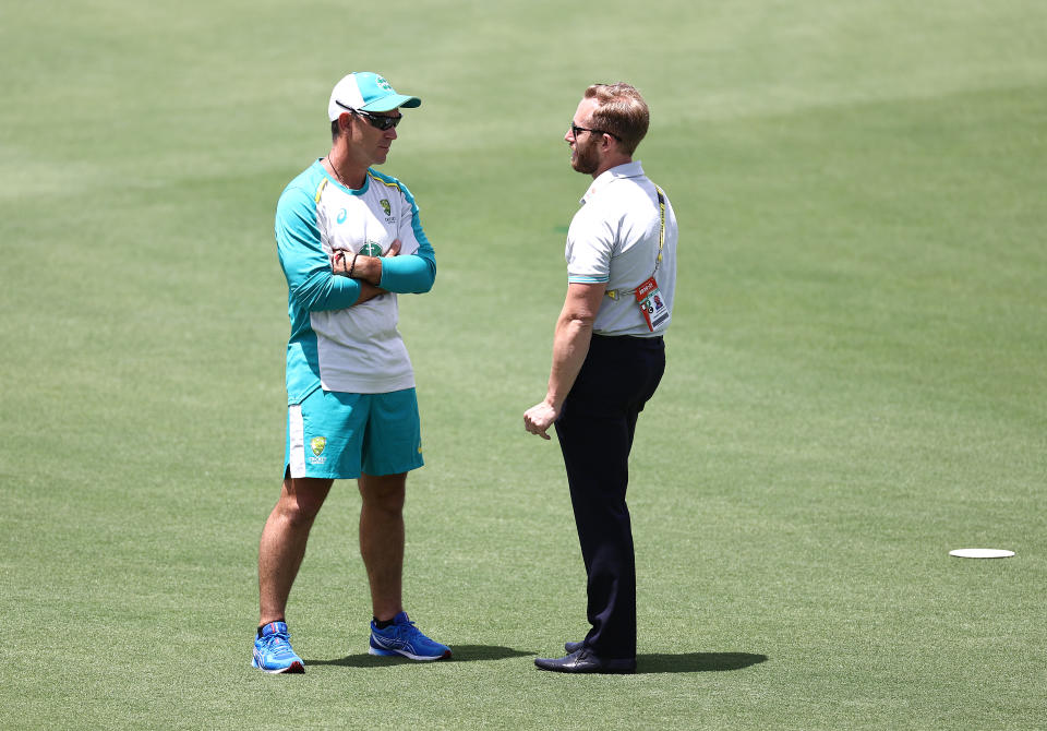 Pictured right, former Australian Team Manager Gavin Dovey speaking to Justin Langer before an ODI match.