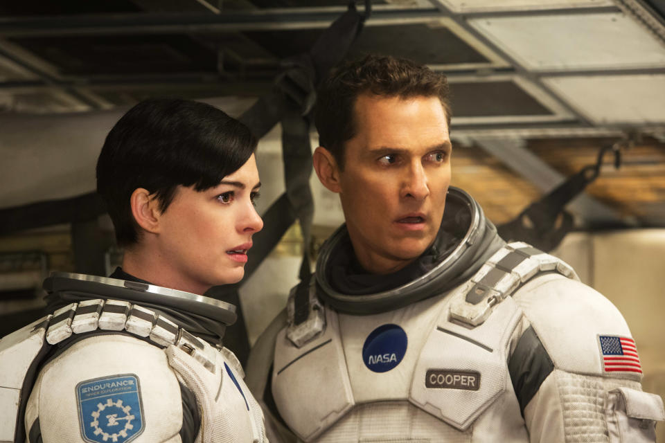 Anne Hathaway and Matthew McConaughey in astronaut suits from a scene in the movie "Interstellar."