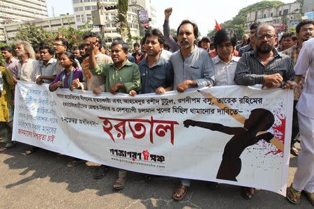 Protesters march in Dhaka on November 3, 2015 during a six-hour-long general strike. REUTERS/Ashikur Rahman
