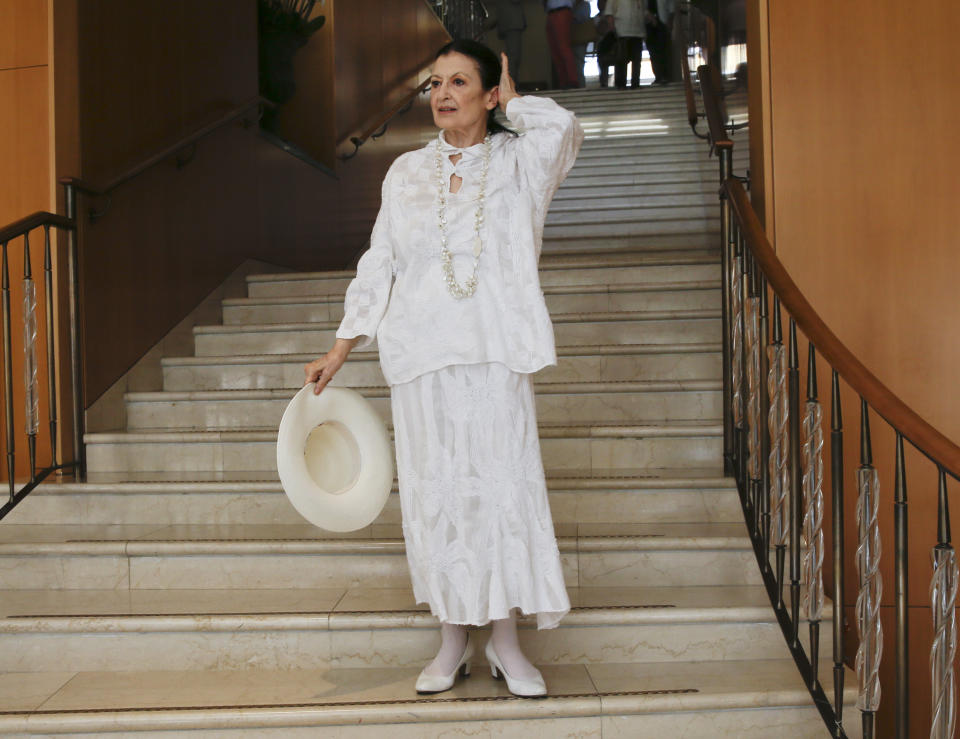Italian ballet dancer Carla Fracci poses as she attends the presentation of the 'Stradivari Festival' in Milan, Italy, Tuesday, July 4, 2017. Carla Fracci, an Italian cultural icon and former La Scala prima ballerina who formed a memorable partnership with Rudolf Nureyev, has died at her home in Milan. She was 84. The La Scala theater announced her death Thursday with “great sadness,” without giving a cause. (AP Photo/Luca Bruno)