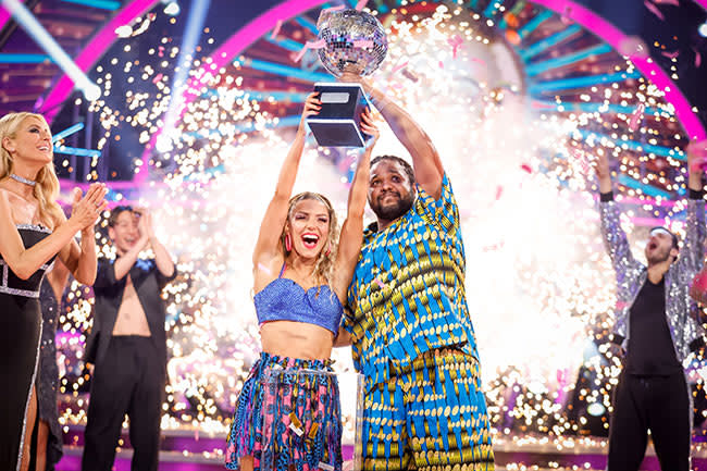 Hamza and Jowita lift the Glitterball trophy