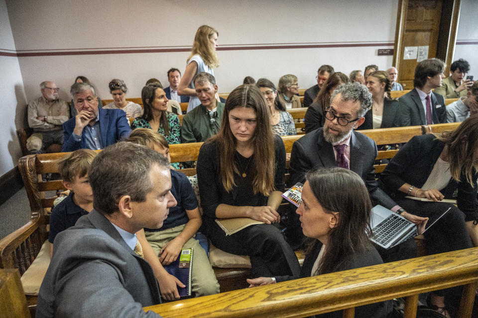 Lead claimant Rikki Held, 22, confers with members of Our Children's Trust legal team before the start of the nation's first youth climate change trial at Montana's First Judicial District Court on June 12, 2023 in Helena, Montana.<span class="copyright">William Campbell—Getty Images</span>