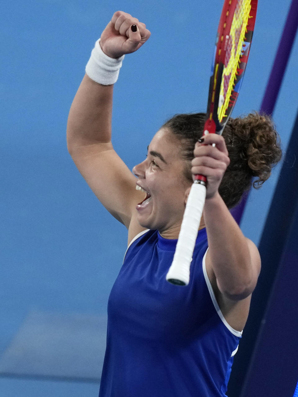 Italy's Jasmine Paolini celebrates after defeating Germany's Angelique Kerber during the United Cup tennis tournament in Sydney, Saturday, Dec. 30, 2023. (AP Photo/Rick Rycroft)