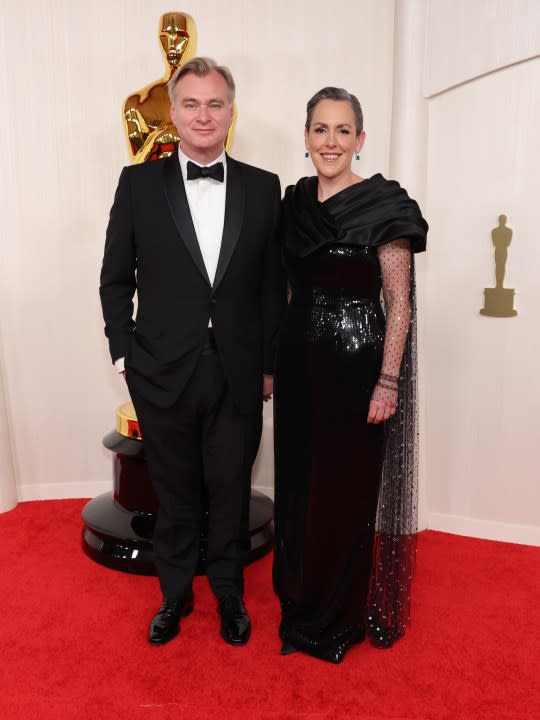 HOLLYWOOD, CALIFORNIA – MARCH 10: (L-R) Christopher Nolan and Emma Thomas attend the 96th Annual Academy Awards on March 10, 2024 in Hollywood, California. (Photo by Mike Coppola/Getty Images)