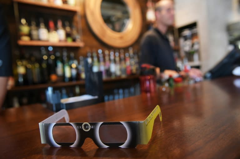 A pair of solar eclipse glasses are seen for sale at a restaurant ahead of the total solar eclipse in Charleston, South Carolina, on August 20, 2017