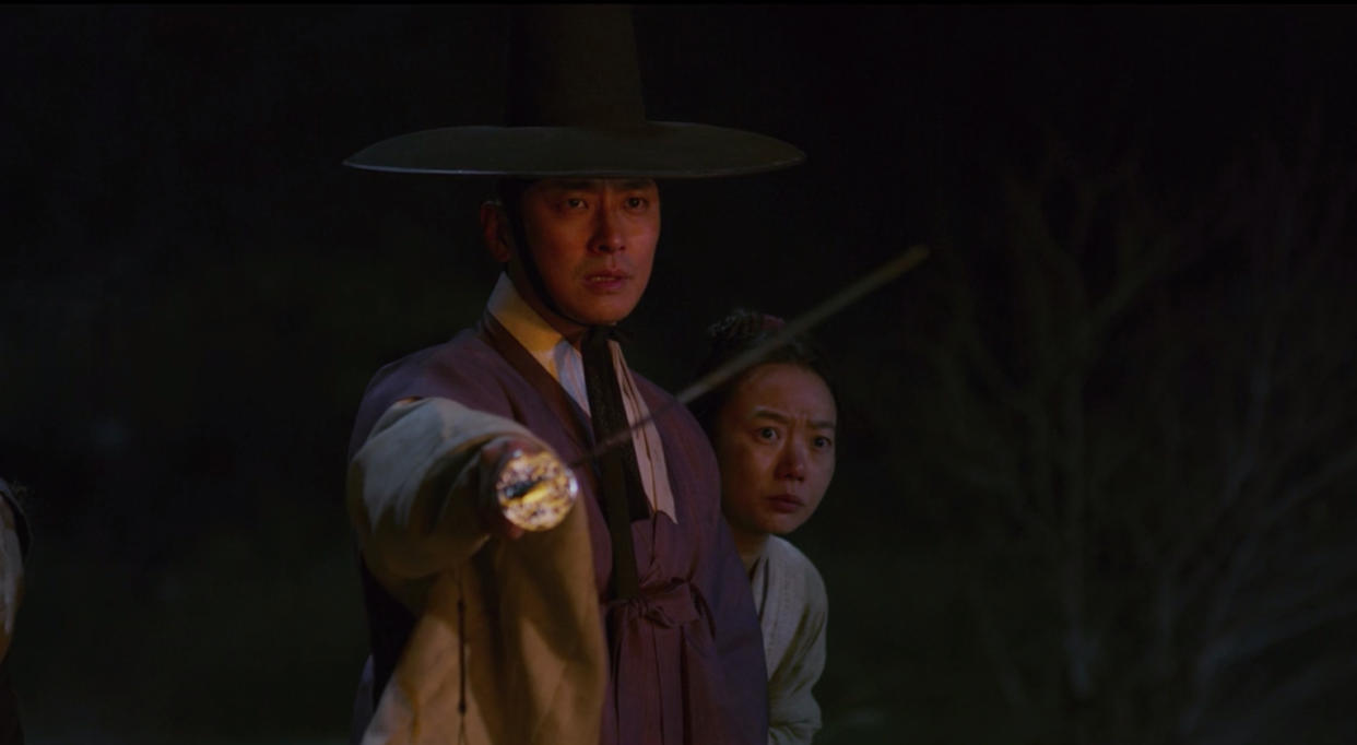 Crown Prince Chang and Seo Bi battle zombies in “Kingdom”.