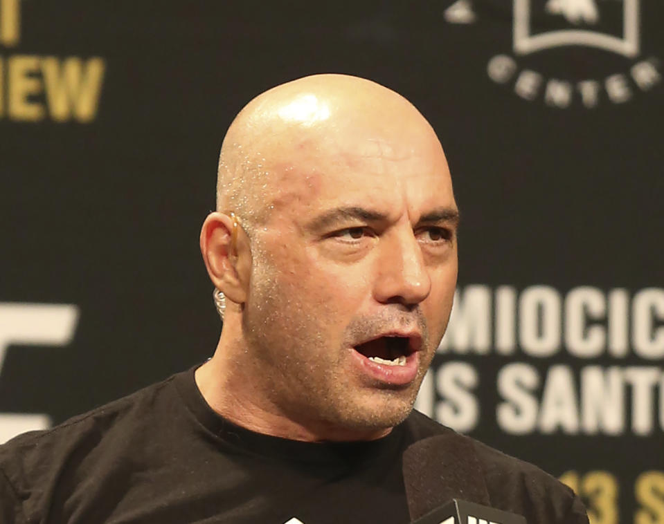 FILE - Joe Rogan is seen during a weigh-in before UFC 211 on Friday, May 12, 2017, in Dallas. Spotify has penned a new multi-year partnership deal with Rogan, Friday, Feb. 2, 2024. The enormously popular show will soon also be available on competing platforms, including YouTube and Apple Podcasts. ( AP Photo/Gregory Payan, File)