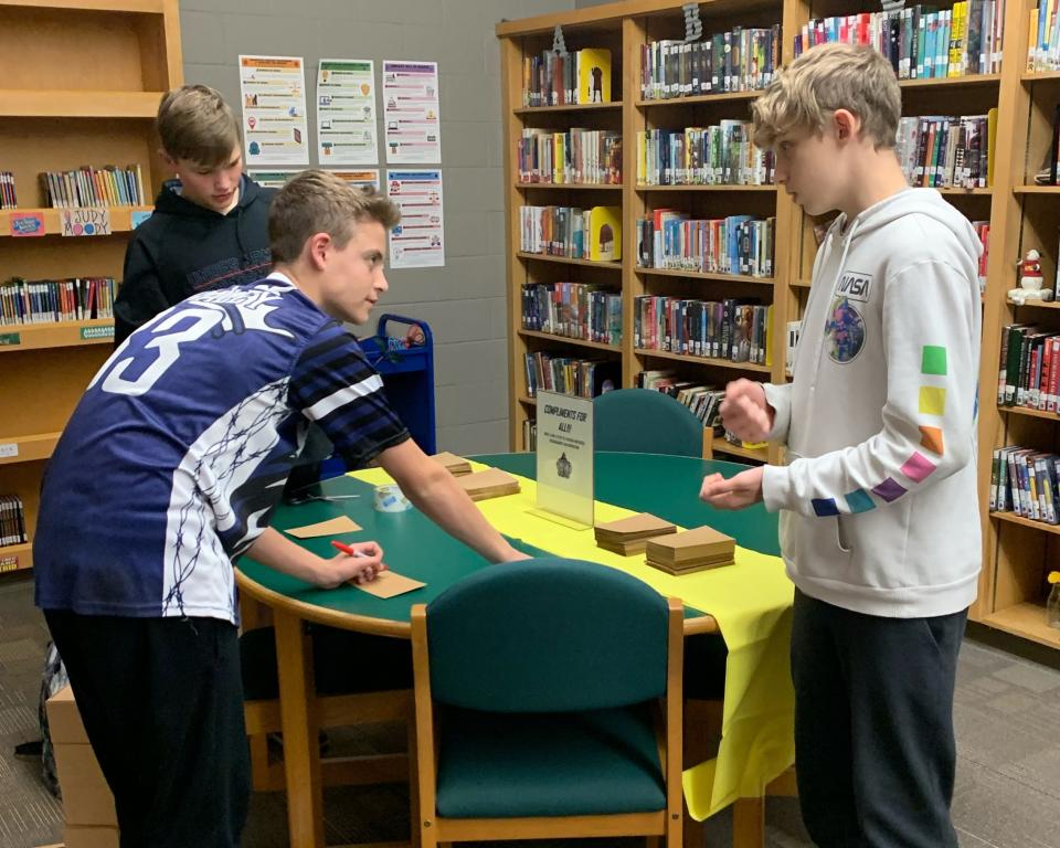 KINDNESS CHALLENGE NOTES: Tables around the campus featured “Gratitude Jar” stations filled with note paper and envelopes where students and staff were able to write a message of thanks that would be delivered to the recipient for them to read.