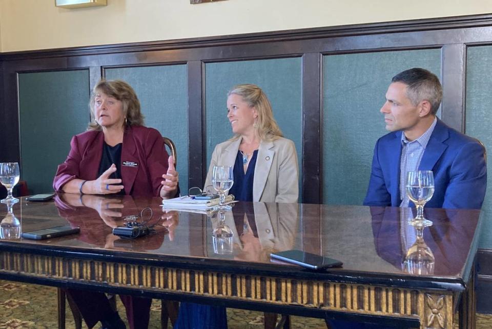 Idaho Rep. Barbara Ehardt, R-Idaho Falls, (left) discusses the Greater Idaho movement with Oregon Rep. Vikki Breese-Iverson, R-Prineville, (middle) and Matt McCaw, spokesman for the group leading the effort on Oct. 19, 2023, at the Geiser Grand Hotel in Baker City, Ore. Voters in 12 Oregon counties asked their leaders to discuss seceding from the state and joining Idaho.