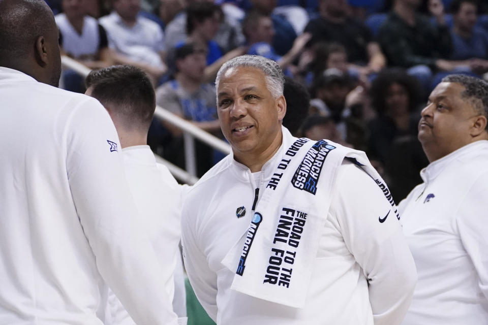 Kansas State assistant coach Kevin Sutton stands during a timeout in the second half of a first-round college basketball game against Montana State in the men's NCAA Tournament on Friday, March 17, 2023, in Greensboro, N.C. (AP Photo/John Bazemore)