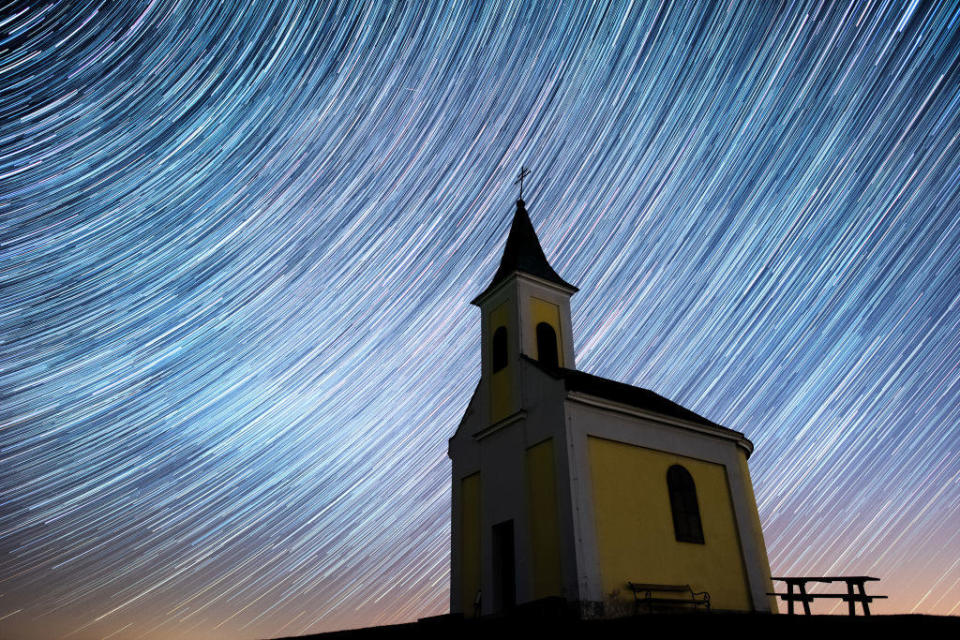 Startrails are seen during the Lyrids meteor shower over Michaelskapelle on April 20, 2020 in Niederhollabrunn, Austria.  / Credit: Thomas Kronsteiner / Getty Images