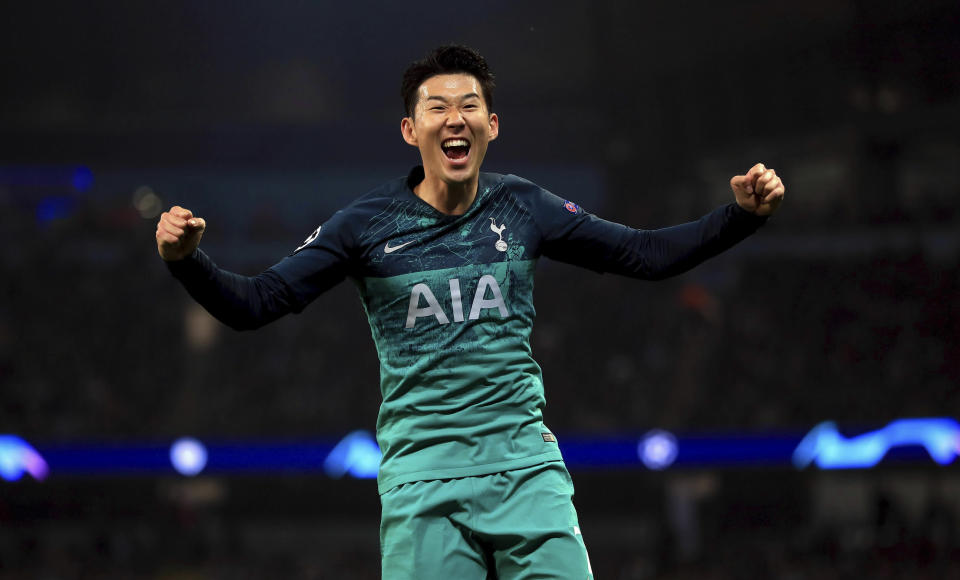 Tottenham Hotspur's Son Heung-min celebrates his side's third goal scored by Fernando Llorente during the  Champions League quarterfinal second leg soccer match at the Etihad Stadium, Manchester, England, Wednesday April 17, 2019. (Mike Egerton/PA via AP)