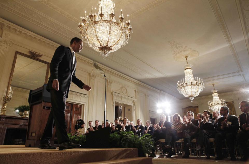 FILE - In this Feb. 13, 2009, file photo, President Barack Obama steps off the stage after addressing business leaders about the economy in the East Room of the White House in Washington. (AP Photo/Charles Dharapak, File)