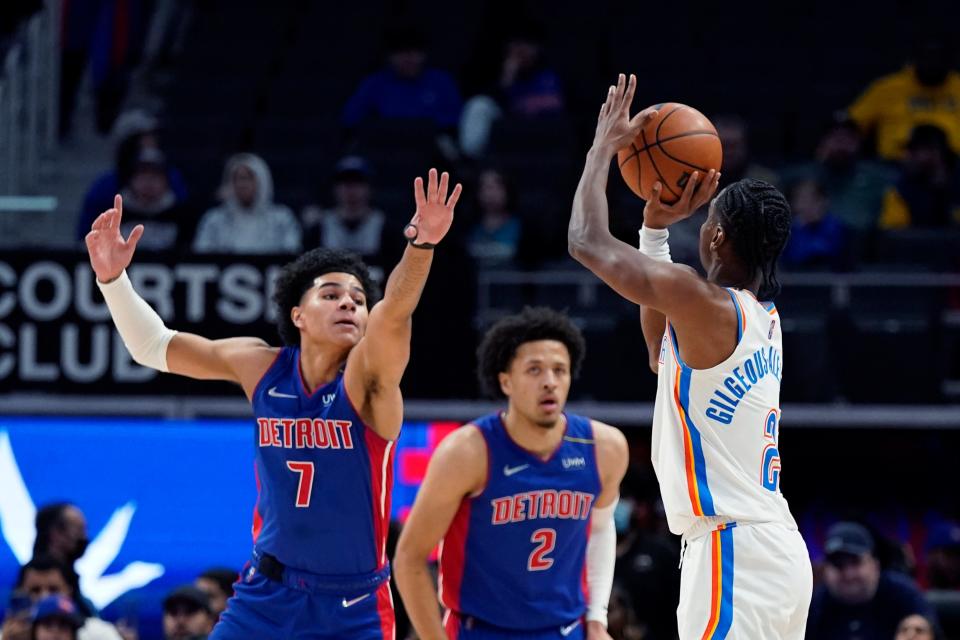 Thunder guard Shai Gilgeous-Alexander (2) shoots over Pistons guard Killian Hayes (7) during the first half Monday in Detroit.