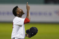 Boston Red Sox starting pitcher Robinson Leyer points upward as he heads to the dugout after throwing in the first inning of the team's baseball game against the Atlanta Braves, Wednesday Sept. 2, 2020, in Boston. (AP Photo/Charles Krupa)