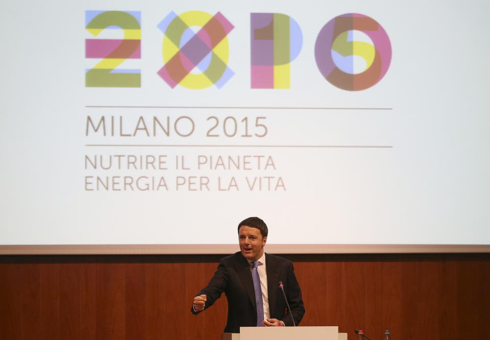 Italian Prime Minister Matteo Renzi delivers his speech during his visit in Milan, Italy, Tuesday, May 13, 2014. Renzi later visited the Expo 2015 construction site, where more than 132 countries will be establishing their pavilions for the world's fair that will open on May 1, 2015 and continue until the end of October of that year. (AP Photo/Antonio Calanni)