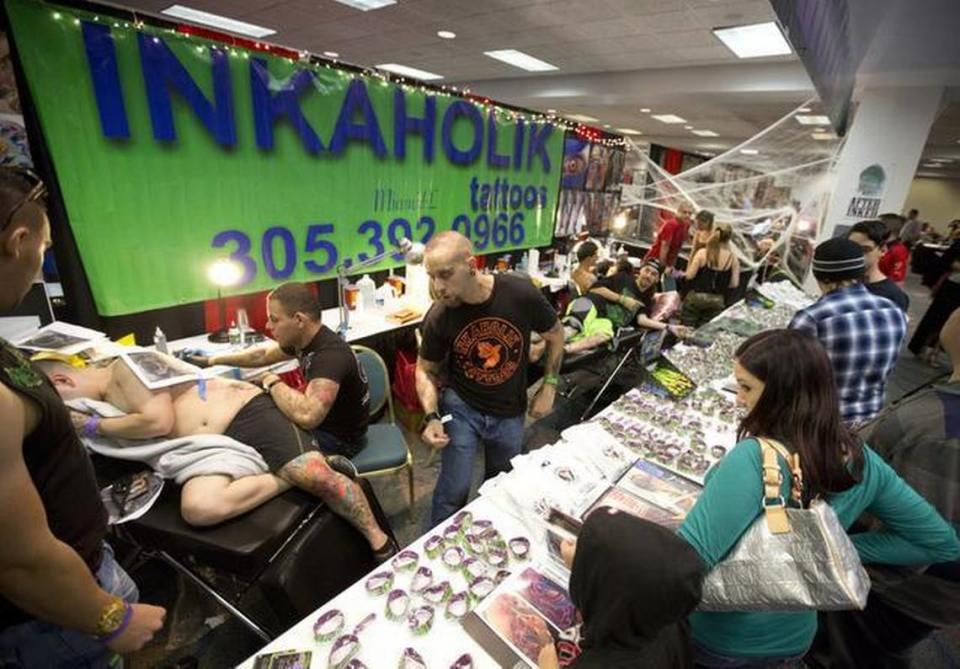 Inkaholik, a Miami-based Tattoo and body piercing parlor, set up shop at TattooLapalooza, serving up special prices for tattoos and other services on Jan. 4, 2013.