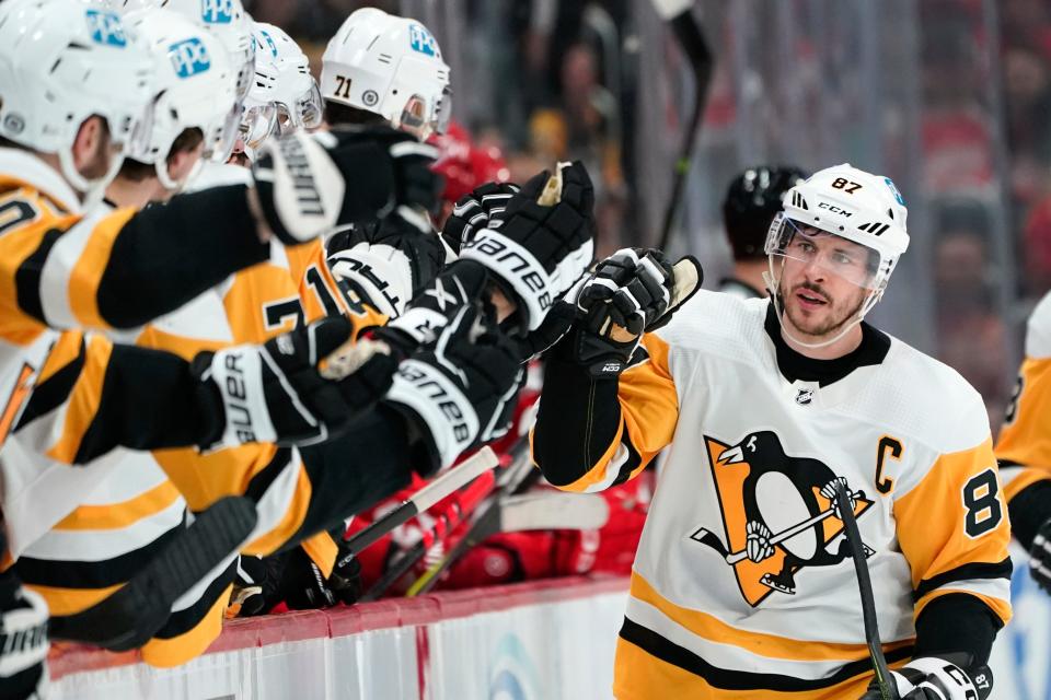 Penguins center Sidney Crosby celebrates his goal against the Red Wings in the first period on Saturday, April 8, 2023, at Little Caesars Arena.
