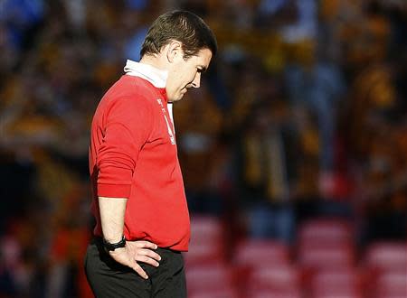 Sheffield United's manager Nigel Clough reacts after losing to Hull City in their English FA Cup semi-final soccer match at Wembley Stadium in London, April 13, 2014. REUTERS/Darren Staples