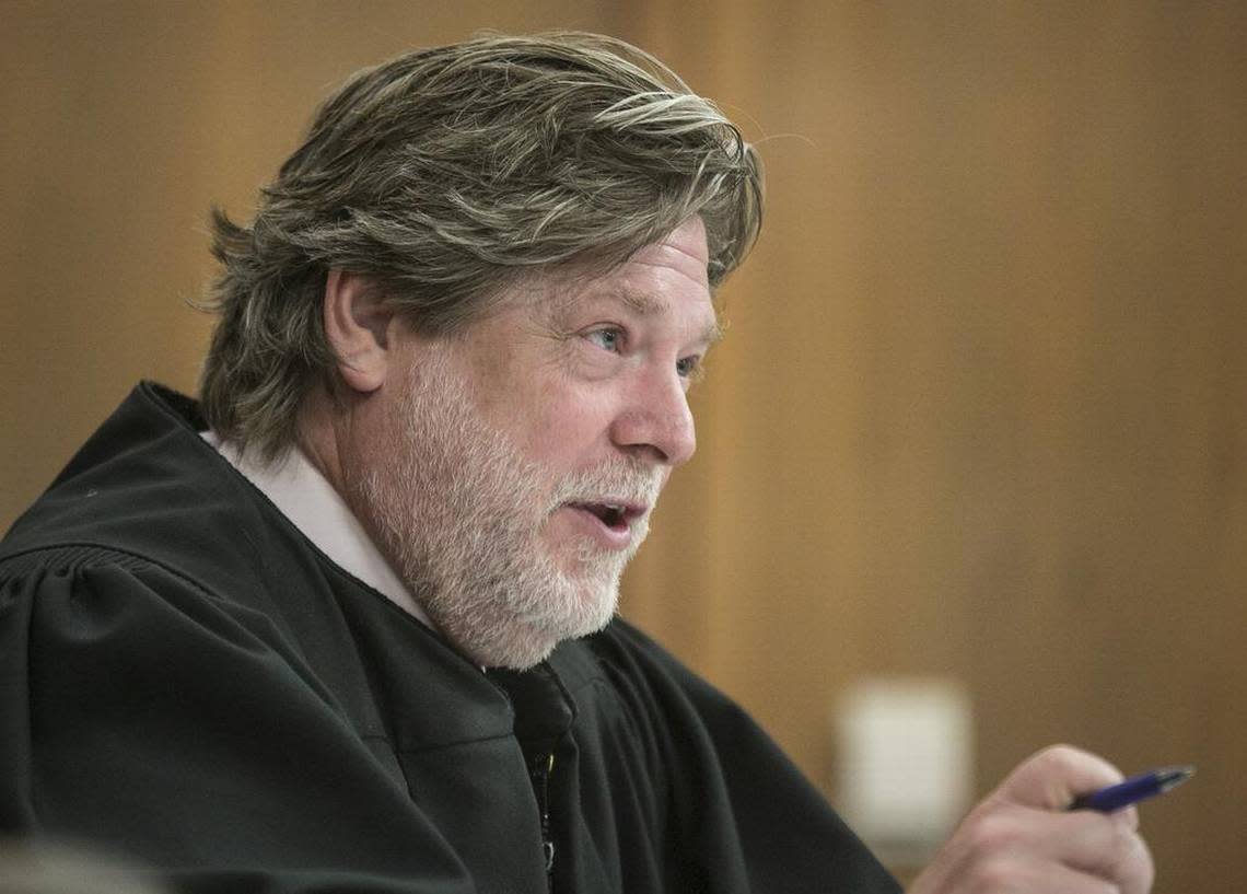 Sedgwick County District Judge Jeffrey Goering speaks to Braden Smith, the last defendant accused in the 2013 deaths of Roger and Melissa Bluml. Smith plead guilty during his hearing Monday morning. (Sept. 14, 2015)