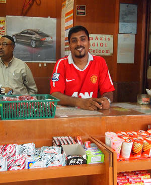 For Ajimul Naseerullakhan (right), the station proved to be more than just a place where he earns a living. (Yahoo! photo)