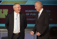 FILE - In this Tuesday, Oct. 20, 2015, file photo, Vice President Joe Biden talks with former Vice President Walter Mondale as they participate in a forum honoring Mondale's legacy, at George Washington University in Washington. Mondale, a liberal icon who lost the most lopsided presidential election after bluntly telling voters to expect a tax increase if he won, died Monday, April 19, 2021. He was 93. (AP Photo/Molly Riley, File)