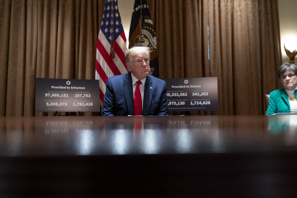 President Donald Trump meets with Kansas Gov. Laura Kelly on May 20, 2020, in the Cabinet Room of the White House