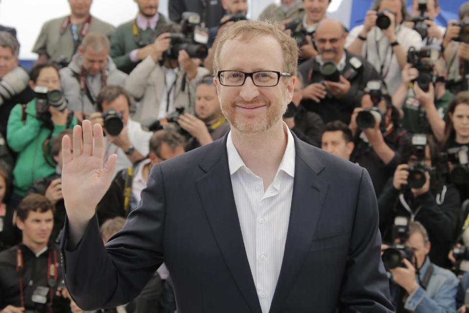 Director James Gray gestures as he poses for photographers during a photo call for the film The Immigrant at the 66th international film festival, in Cannes, southern France, Friday, May 24, 2013. (AP Photo/Francois Mori)