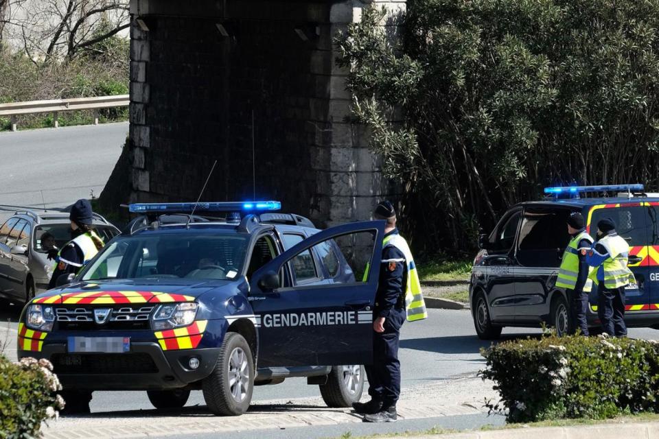 French gendarmes block an access to Trebes (AFP)