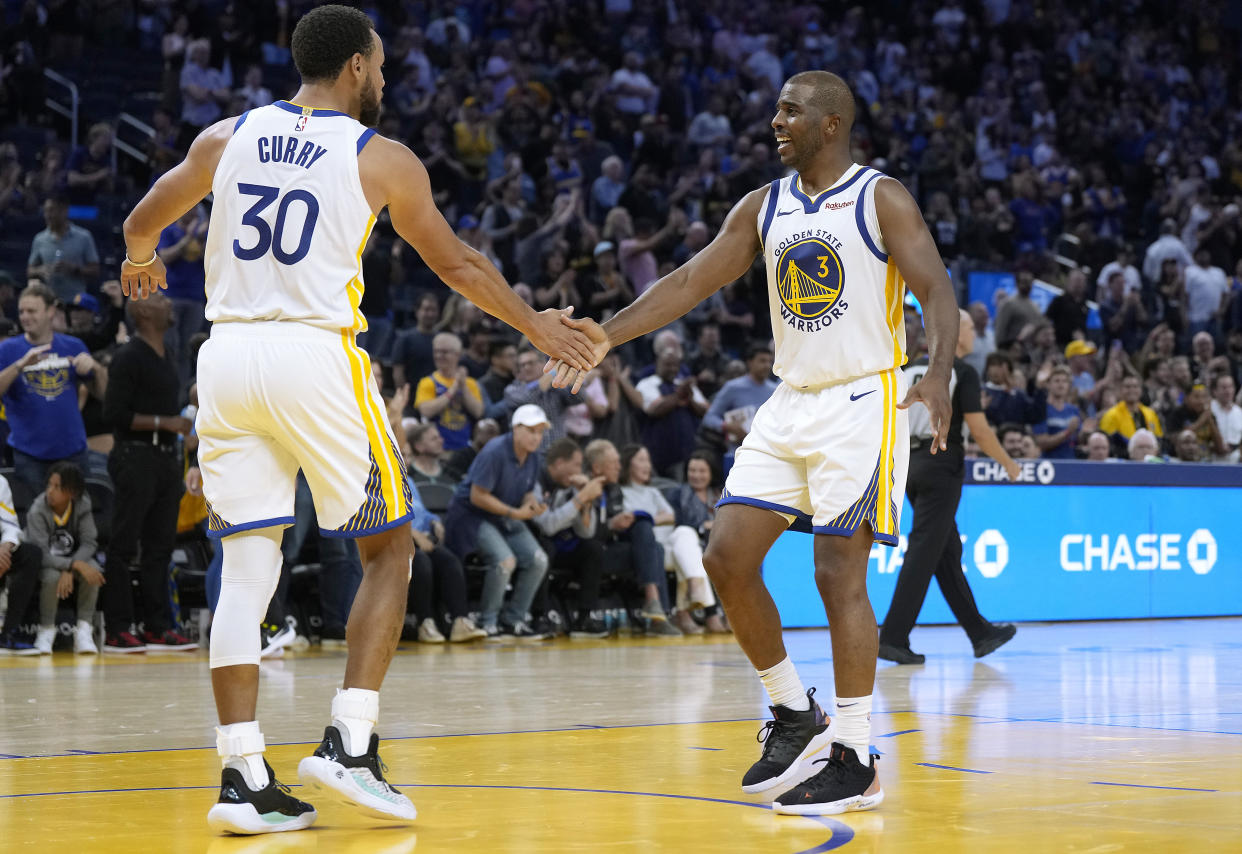So far so good for the Chris Paul experiment in Golden State. (Thearon W. Henderson/Getty Images)