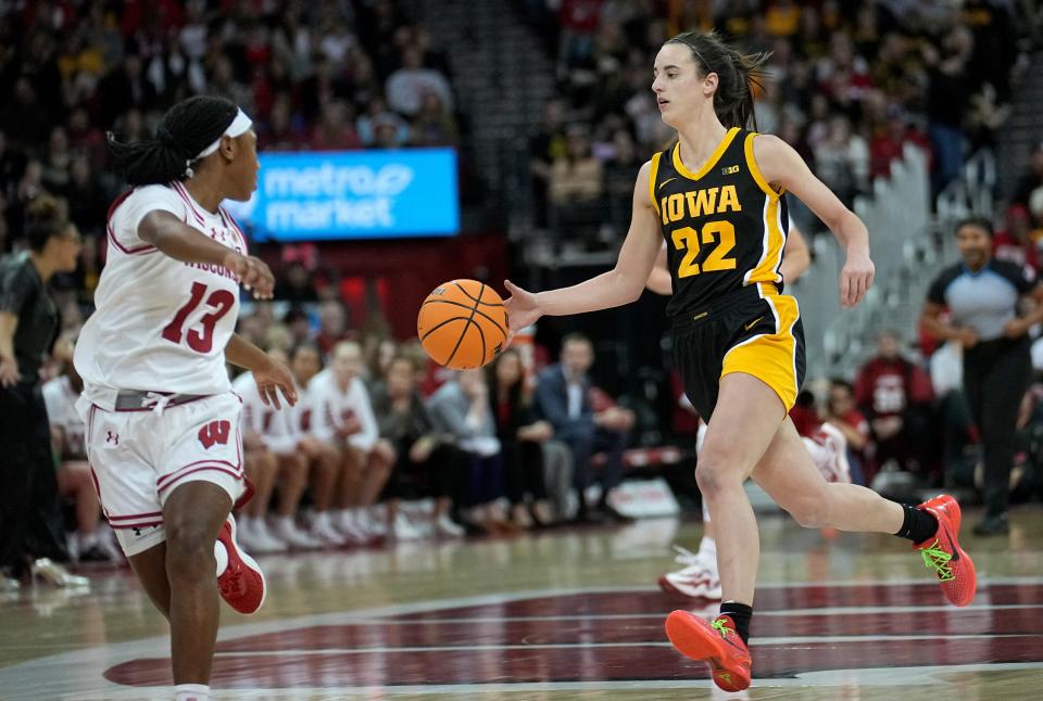 Iowa guard Caitlin Clark (22) is on a fast break during the second half of their game Sunday, December 10, 2023 at the Kohl Center in Madison, Wisconsin. Iowa beat Wisconsin 87-65. Mark Hoffman/Milwaukee Journal Sentinel-USA TODAY NETWORK