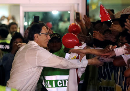 Peru's Vice President Martin Vizcarra salutes supporters after arriving in Lima, Peru, March 23, 2018. REUTERS/Guadalupe Pardo