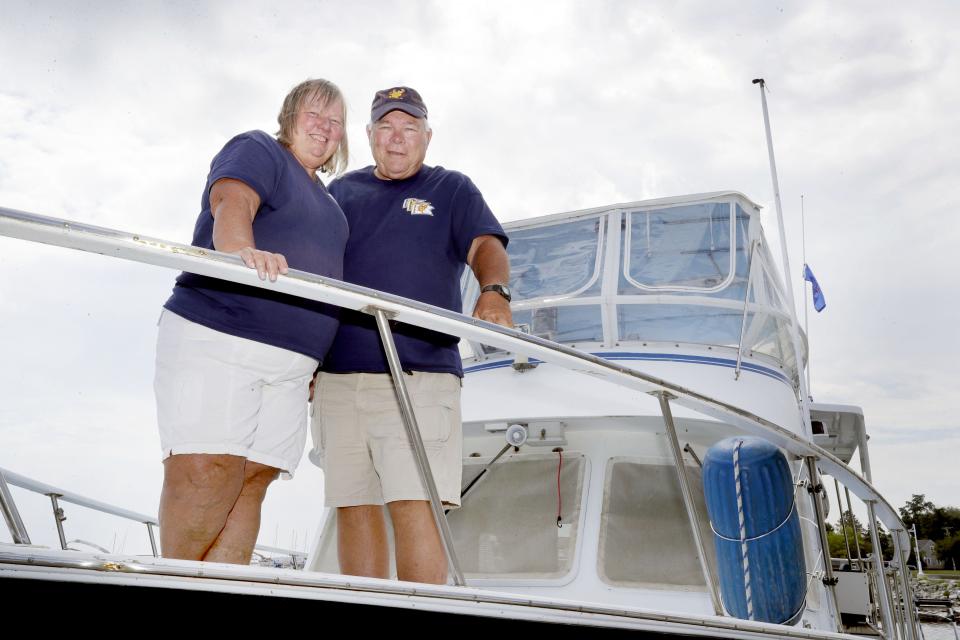 Sue and Rick Rosenwald, of Sheboygan, just completed "America's Great Loop," a 6,000-mile journey that circumnavigates the eastern part of the U.S. and Canada. The couple poses in their boat, Friday, August 19, 2022, at the Sheboygan Marina in Sheboygan, Wis.
