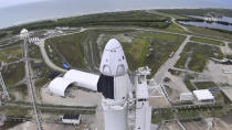 In this image made from video via NASA-TV, a SpaceX Falcon 9, with NASA astronauts Doug Hurley and Bob Behnken in the Dragon crew capsule, prepare to lift off from Pad 39-A at the Kennedy Space Center in Cape Canaveral, Fla., Wednesday, May 27, 2020. The two astronauts are on the SpaceX test flight to the International Space Station. (NASA via AP)