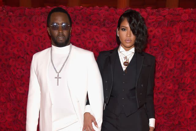 <p>Kevin Mazur/MG18/Getty</p> Sean 'Diddy' Combs and Cassie in New York City in May 2018