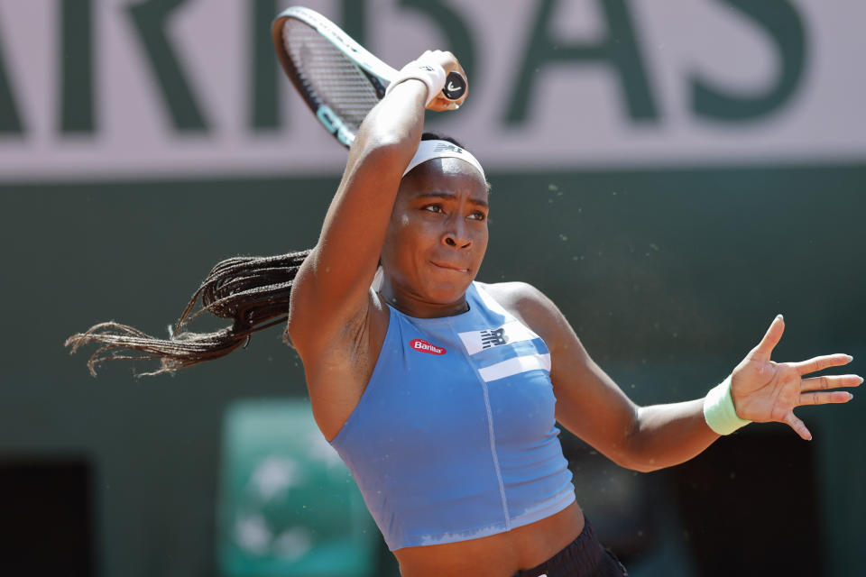 Coco Gauff of the U.S. plays a shot against Spain's Rebeka Masarova during their first round match of the French Open tennis tournament at the Roland Garros stadium in Paris, Tuesday, May 30, 2023. (AP Photo/Jean-Francois Badias)