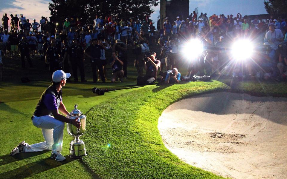 Rory McIlroy poses with the Wanamaker Trophy after winning the 2014 PGA Championship