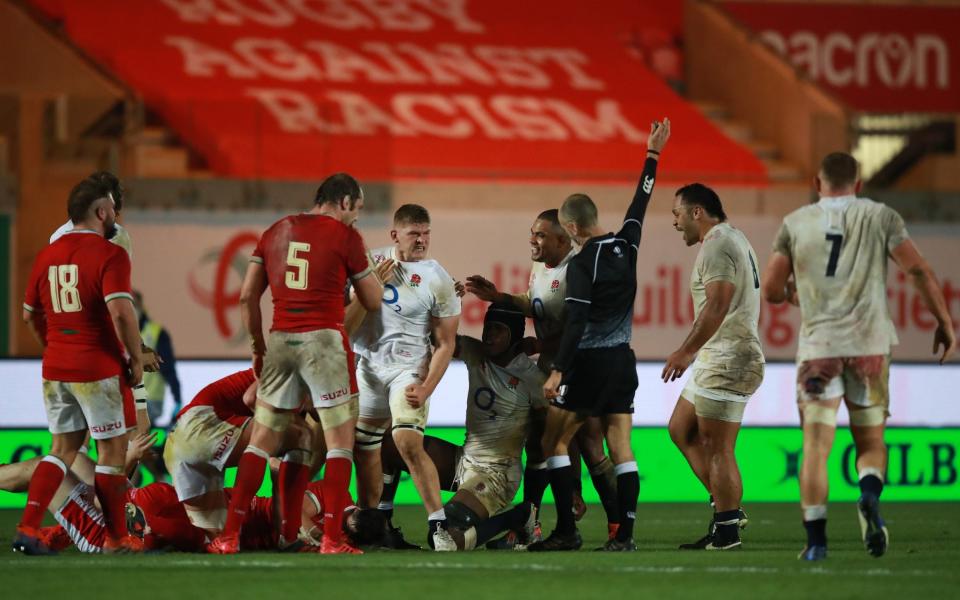 Jack Willis of England celebrates after winning the ball in a maul during the Autumn Nations Cup match between Wales and England - GETTY IMAGES